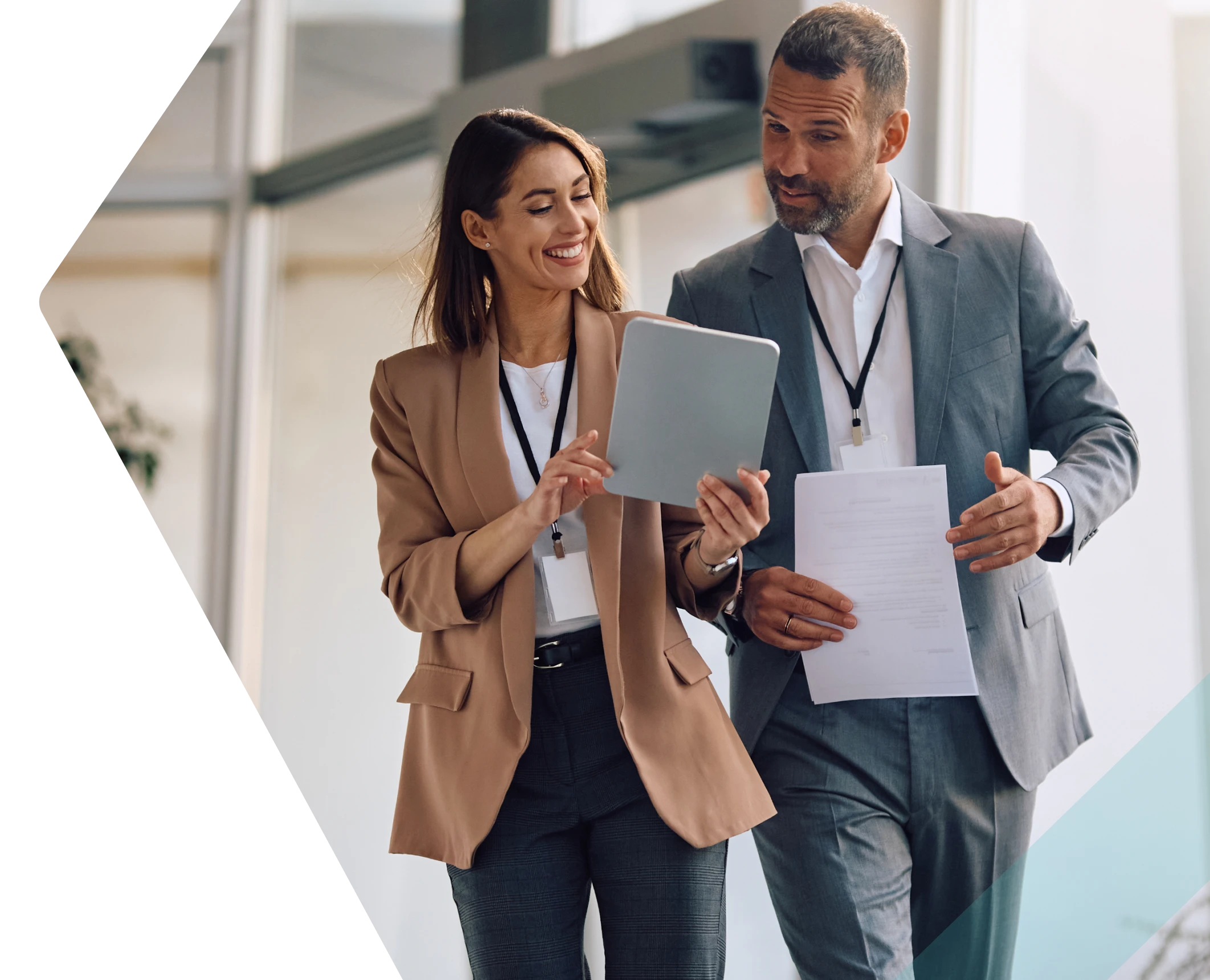 Two professionals reviewing documents together